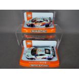 Scalextric - 2 x 2014 McLaren 12C GT3 cars from the Macau GT Cup series,