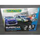 Scalextric - A Supercar Challenge Scalextric set which is still factory sealed so appears Mint.