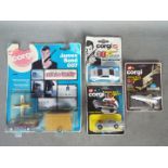 Corgi Juniors - A group of four carded James Bond themed diecast model vehicles from Corgi Juniors.