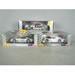 Maisto - Three boxed 1:18 scale diecast GT racing cars from Maisto.
