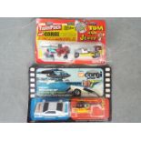 Corgi Juniors - Two carded carded Film and Comic themed Twin Pack diecast model vehicles from Corgi