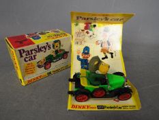 Dinky Toys - A boxed Dinky Toys #447 Parsley's Car 'Bull Nose Morris'.