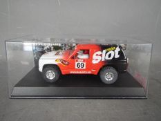 Scalextric - SCX - A limited edition Nissan Patrol TT model made for MAS Slot magazine.