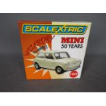Scalextric - A limited edition Mini 50th Anniversary model. # C2980A.