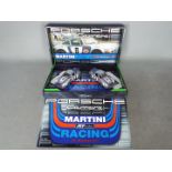 Fly - A 2 x car Porsche 911 Carrera RSR Martini Racing set from the Historical Teams collection.