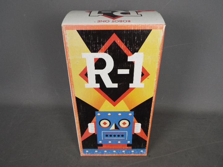 Rocket USA - Robot One, a tinplate battery powered bump and go vintage style robot from 2001. - Image 4 of 4