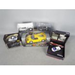 Auto Art, IXO, Corgi, Hongwell, Bburago - Six boxed diecast model cars in various scales.