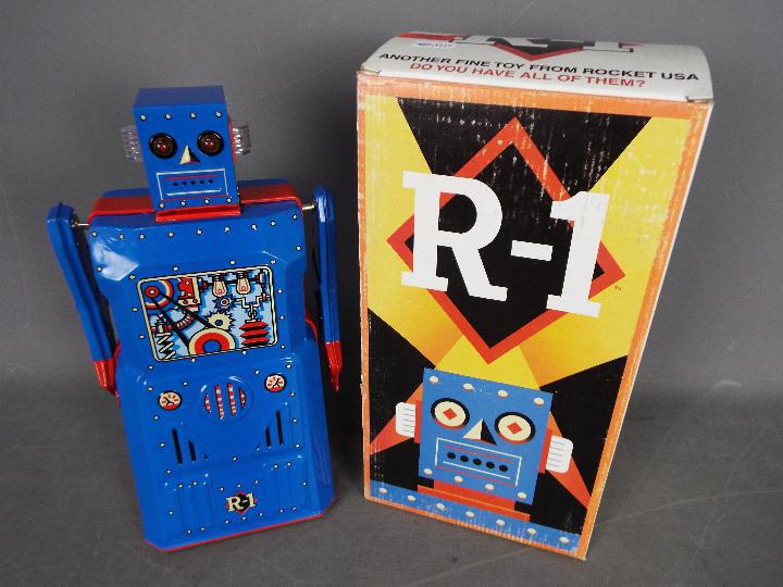 Rocket USA - Robot One, a tinplate battery powered bump and go vintage style robot from 2001.
