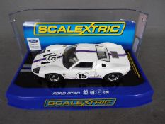 Scalextric - Ford GT40 1966 Le Mans car number 15 driven by Guy Ligier / Bob Grossman. # C3315.