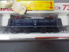 Fleischmann - A boxed Fleischmann #7335 N gauge electric locomotive 110 222-7 in DB blue livery.