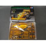 Tamiya - A boxed vintage 1987 Tamiya 1:20 scale 'Grand Prix Collection Series' #57 Lotus 99T Honda