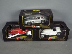 Bburago - Three boxed 1:18 scale diecast model cars by Bburago.