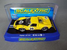 Scalextric - A 1970 Ford GT40 MKII Sebring car in yellow and black as driven by Heppenstall and