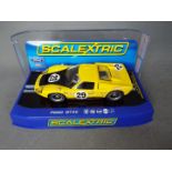 Scalextric - A 1970 Ford GT40 MKII Sebring car in yellow and black as driven by Heppenstall and