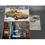 Tamiya - A boxed vintage 1981 Tamiya GC2016 1:20 scale Porsche 928S plastic model kit.