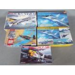 Monogram, Hasegawa - Five boxed plastic model military aircraft kits in various scales.
