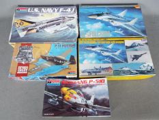 Monogram, Hasegawa - Five boxed plastic model military aircraft kits in various scales.