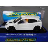 Scalextric - An unusual Ford Focus WRC model in plain white with several differences to the