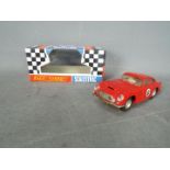 Scalextric - A vintage original 1960s Scalextric Aston DB4 GT model with sunroof. # C.68.