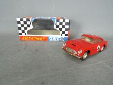 Scalextric - A vintage original 1960s Scalextric Aston DB4 GT model with sunroof. # C.68.