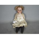 Unconfirmed Maker - A German cabinet doll possibly by Kestner.