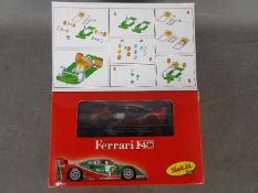 Slot-it - A Ferrari F40 self assembly model kit # KF02C The model appears Mint and the parts are