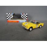Scalextric - A vintage original 1960s Sunbeam Tiger racing car in yellow. # C.83.