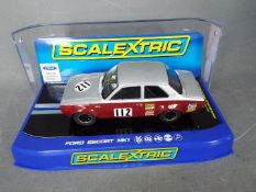 Scalextric - A 1969 Ford Escort MkI Broadspeed model in silver over maroon. # C3212.