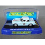 Scalextric - A 1964 Sebring MGB roadster as driven by Frank Morrill and Jim Adams. # C3312.