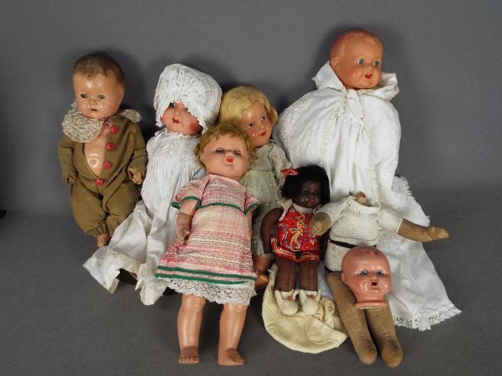 Armand Marseille, Reliable, Others - A group of vintage dolls made from various materials.