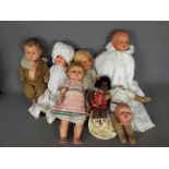 Armand Marseille, Reliable, Others - A group of vintage dolls made from various materials.