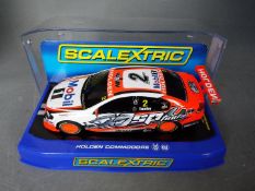 Scalextric - A Holden Commodore race car in Holden Racing Team livery number 2 car as driven by