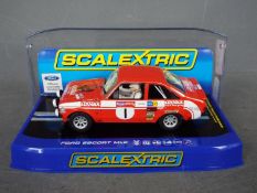Scalextric - Roger Clark's 1975 Welsh Rally winning Ford Escort Mk2 in Cossack livery. # C3483.