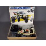Tamiya - An assembled and boxed vintage 1984 release Tamiya #58043 1:10 scale R/C 'The Grasshopper'
