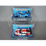 Scalextric - 2 x 2015 Aston Martin Vantage GT3 cars,