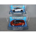 Scalextric - 2 x McLaren 720S models, # C3982, # C3895.