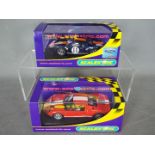 Scalextric - 2 x cars, a Ford GT Top Gear Stig model and a GT40 in Gulf racing livery.