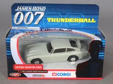 Corgi - James Bond - A signed boxed Thunderball Aston Martin DB5. # TY06901.