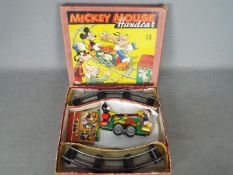 Mickey Mouse Handcar - a tin plate four-wheel clockwork handcar with Mickey and Minnie composite