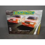 Scalextric - A limited edition 2 x car BMW Team Jagermeister Legends set with a pair of BMW E30 M3