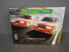 Scalextric - A limited edition 2 x car BMW Team Jagermeister Legends set with a pair of BMW E30 M3