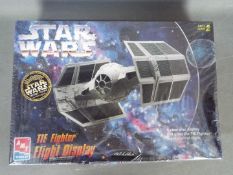 Star Wars, AMT, ERTL - A boxed #8275 Star Wars Tie Fighter Flight Display plastic model kit by AMT.