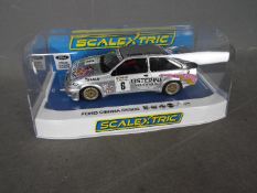 Scalextric - A Ford Sierra RS500 Cosworth in Graham Goode / Listerine Racing livery. # C4146.