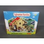 Sylvanian Families - Tomy - A boxed Sylvanian Families Woodland Lodge with accessories including