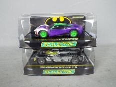 Scalextric - Batman - 2 x cars, a Joker inspired car and a Batman inspired car. # C4140, # C4142.