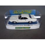 Scalextric - A Dodge Challenger R/T 440 Six Pack model in the rare plain white finish. C3935.