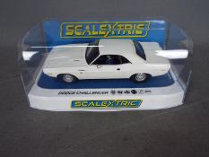 Scalextric - A Dodge Challenger R/T 440 Six Pack model in the rare plain white finish. C3935.