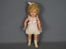 Ideal - An Ideal composition Shirley Temple doll.