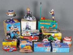 MYK - Meccano - GSM - A group of 11 x mostly boxed tin plate toys of various ages including a wind