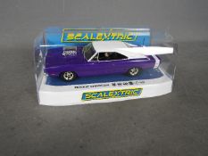 Scalextric - A boxed Dodge Charger R/T in purple. # C4148.